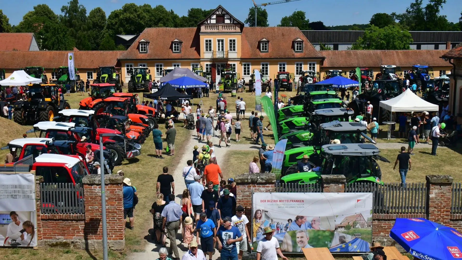 People visiting Triesdorf Johannitag exhibition for agricultural machinery